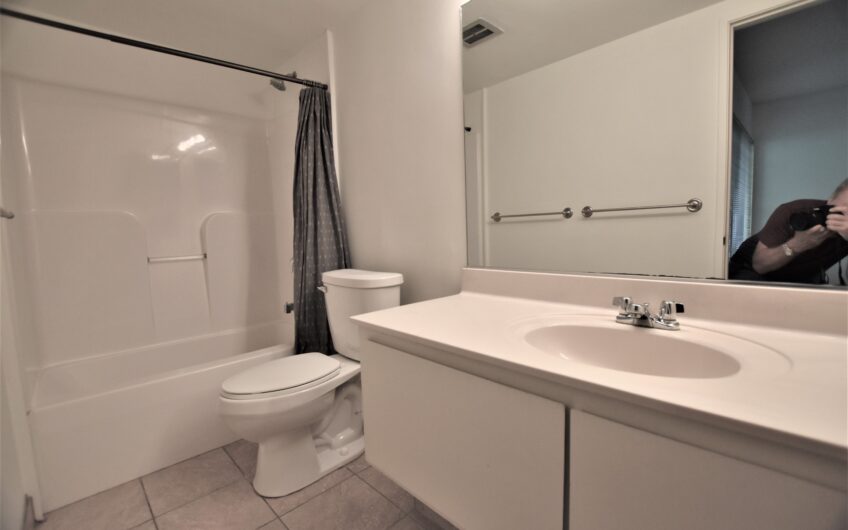 Three Bedroom 1-1/2 Bath Condo Located 3/4 Mile East of UM Campus